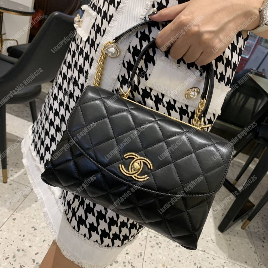 Ch*el flap bag with top handle lambskin black