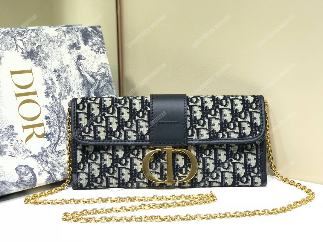30 Montaigne Jacquard Canvas Clutch Bag Blue
