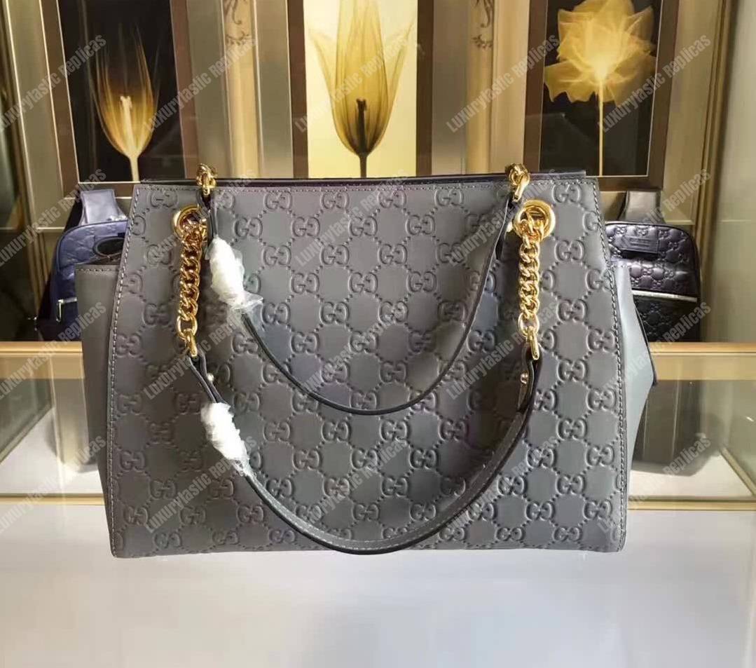 G*u*i signature medium top handle bag gray