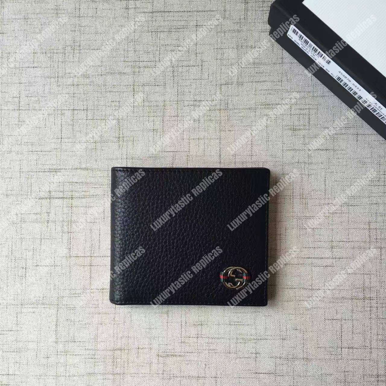 G*u*i leather bi-fold wallet black